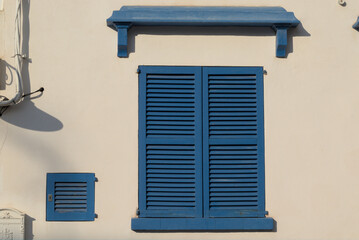 Navy blue rustic wooden window blind