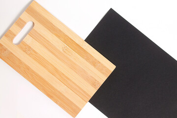 The Diagonal Light Bamboo Board and Black Square Background