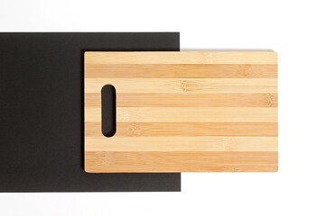 The Light Bamboo Board and Black Square Background