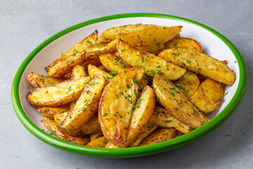 Baked spiced potatoes look delicious.