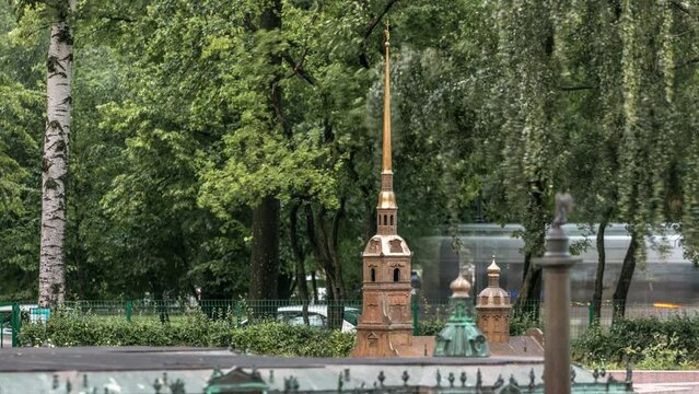 Enchanting Alexander Park Miniature City Timelapse in St. Petersburg: Intricate Model of Peter and Paul Cathedral Amidst Lush Greenery.