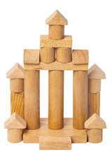 Wooden isolated house. Wooden toy castle constructed of cubes, cylinders, triangles and other shapes made of beech wood. Wooden toy blocks. Macro.