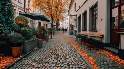 Autumnal cozy street with a coffee shop terrace