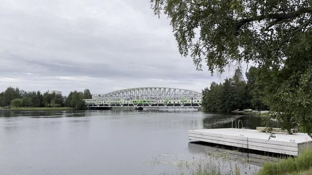 Oulu, Finland – 08/24/2023:train crossing Oulujoki river