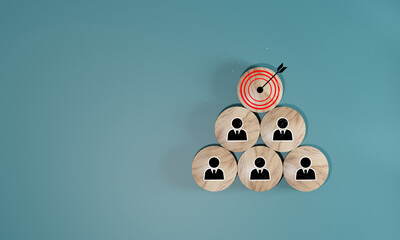Red dartboard and black arrow with human icon for customer focus target group and customer relation...