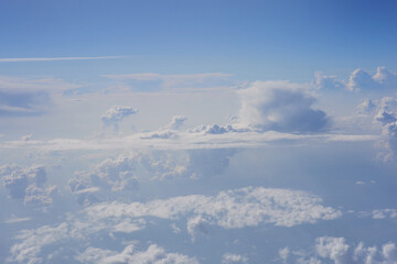 Fototapeta na wymiar Clouds, view from the plane window