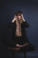 woman sitting on a chair. Boudoir photography. Concept photography