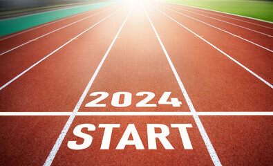 Start of new year 2024 on Running track. Concept of new ideas starting in new year, planning along...