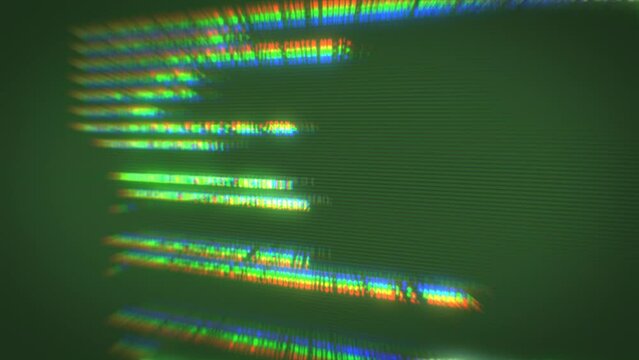 Typing a digital code by a programmer in a programming language, luminous letters and numbers. Making computer programs green background