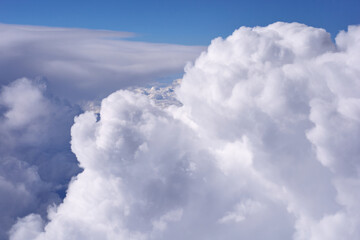 Naklejka na ściany i meble Clouds, view from the plane window