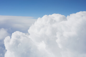 Naklejka na ściany i meble Clouds, view from the plane window