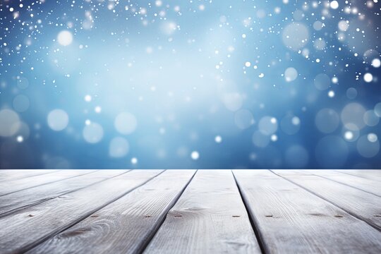 Beautiful winter snowy blurred defocused blue background and empty wooden flooring. Flakes of snow fall and sparkle on light, copy space, Generative AI