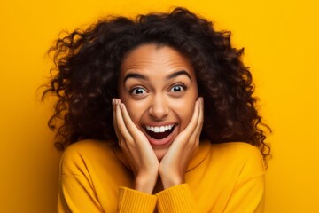 Close-up portrait photography of a grinning girl in her 20s putting hands on the face in a gesture of terror against a bright yellow background. With generative AI technology
