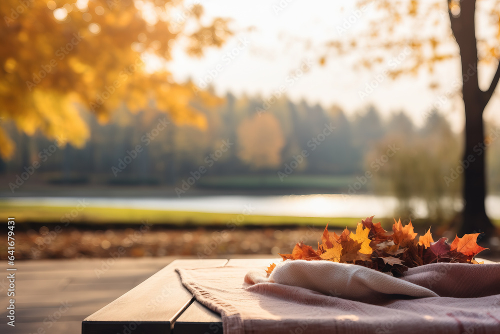 Poster a cozy outdoor scene with colorful leaves and a picnic blanket background with empty space for text