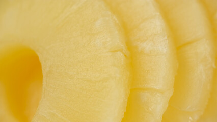 Canned pineapple slices close up
