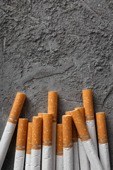 Concept of addiction to smoking, many cigarette filters, close-up.