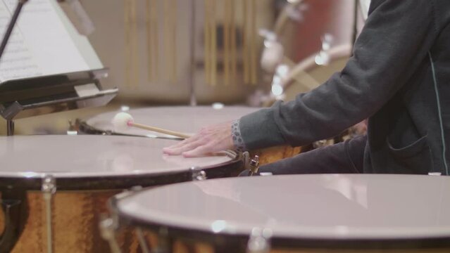 Timpani Drum (Drummer) In A Symphony Orchestra; Percussion Instrument.