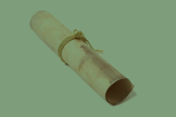 scroll of antique paper tied with a golden rope