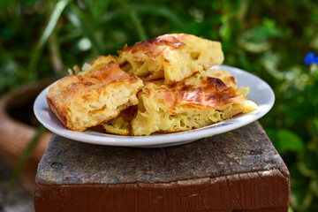 Fresh baked home made  Mini cheese puff pastries.Cheese pie with phyllo pastry and herbs