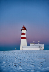 Alnes lighthouse in a winter sunset, Godøy, Ålesund, Norway