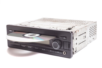 Fototapeta premium Old car radio with cd disk isolated on white background