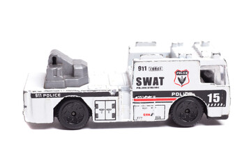 Toy police car on a white background © yurchello108