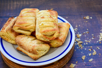 Fresh baked home made  Mini cheese puff pastries.Cheese pie with phyllo pastry and herbs
