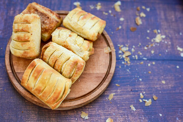 Fresh baked home made  Mini cheese puff pastries.Cheese pie with phyllo pastry and herbs