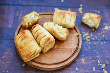 Fresh baked home made  Mini cheese puff pastries.Cheese pie with phyllo pastry and herbs