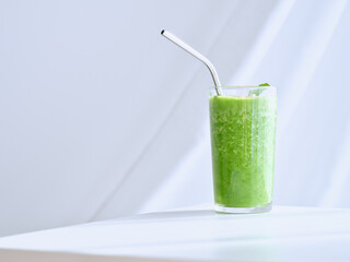 Delicious green smoothie in studio