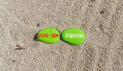 Zero-sum situation symbol. Concept words Zero-sum situation on beautiful green stone. Beautiful sand beach background. Business psychology zero-sum situation concept. Copy space.