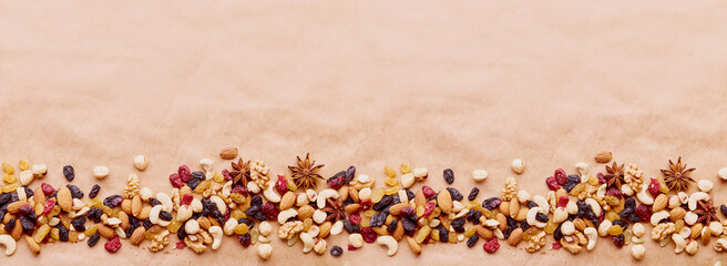 Aesthetic assorted nuts in line. Healthy food and snacks. Walnuts, almonds, hazelnuts and cashews....