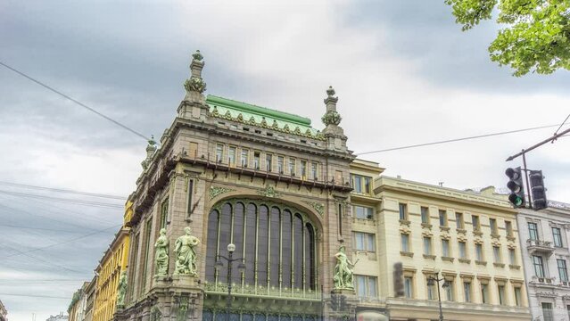Dynamic Nevsky Prospect Traffic Timelapse Hyperlapse near Eliseevsky Store, Featuring N.P. Akimova Comedy Theatre, Against a Cloudy Sky. St. Petersburg, Russia.