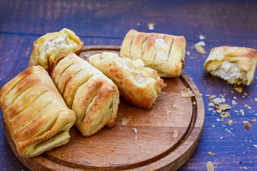 Fresh baked home made  Mini cheese puff pastries.Cheese pie with phyllo pastry and herbs