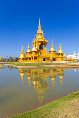 The Gold pagoda in Wat Rong Khun or White Temple, Landmark, Chiang Rai, Thailand.