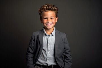 Lifestyle portrait photography of a grinning kid male putting hands on hips against a cool gray background. With generative AI technology