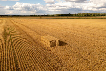 Drone photography of agriculture fields and square hale bales