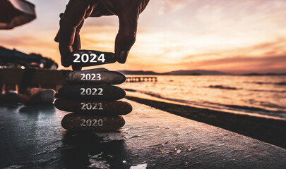 Happy new year 2024 replace old 2023. New Year 2024 is coming concept idea on orange sky. High...