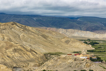 Namgyal Gompa Gumba Monastery in Upper Mustang of Tibetan Nepal with beautiful green desert