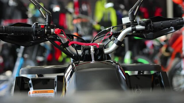 ATVs are sold in a motorcycle shop. Close-up of the control panel