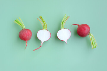 Fresh radish and sliced on green background, Organic vegetable