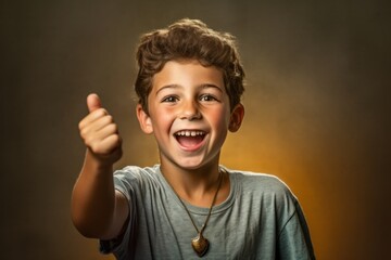 Studio portrait photography of a cheerful kid male pointing forward showing off a delicate necklace at the dead sea in israel/jordan. With generative AI technology