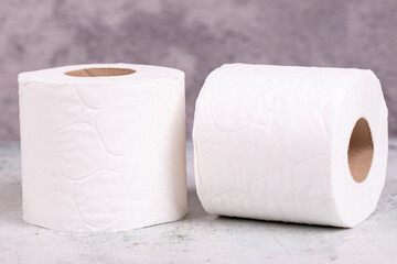 Toilet paper. Toilet paper rolls on gray background