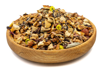 Dried winter tea. Sun-dried winter tea in wood bowl isolated on white background. herbal medicine