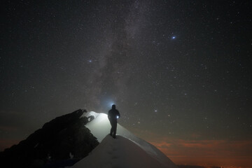 The Milky Way above Eiger summit view from Mittellegi Ridge. © Jacek