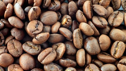 Coffee beans with spoon and glass ready to be served