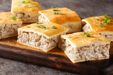 Delicious breakfast Sausage Cream Cheese Crescent Rolls close-up in a board on the table. Horizontal