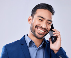 Business, phone call or man with a smile, communication or entrepreneur on a white studio background. Person, employee or lawyer with a smartphone, contact with conversation or discussion with a deal