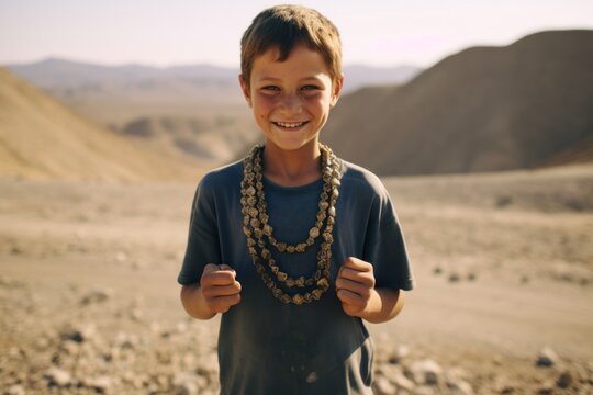 Lifestyle portrait photography of a joyful boy in his 20s shaking hands donning a stunning statement necklace at the darvaza gas crater in derweze turkmenistan. With generative AI technology