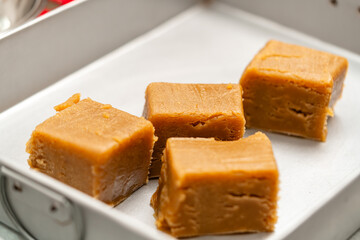 Mooncake making process. A mooncake  is a Chinese bakery product traditionally eaten during the Mid-Autumn Festival.
